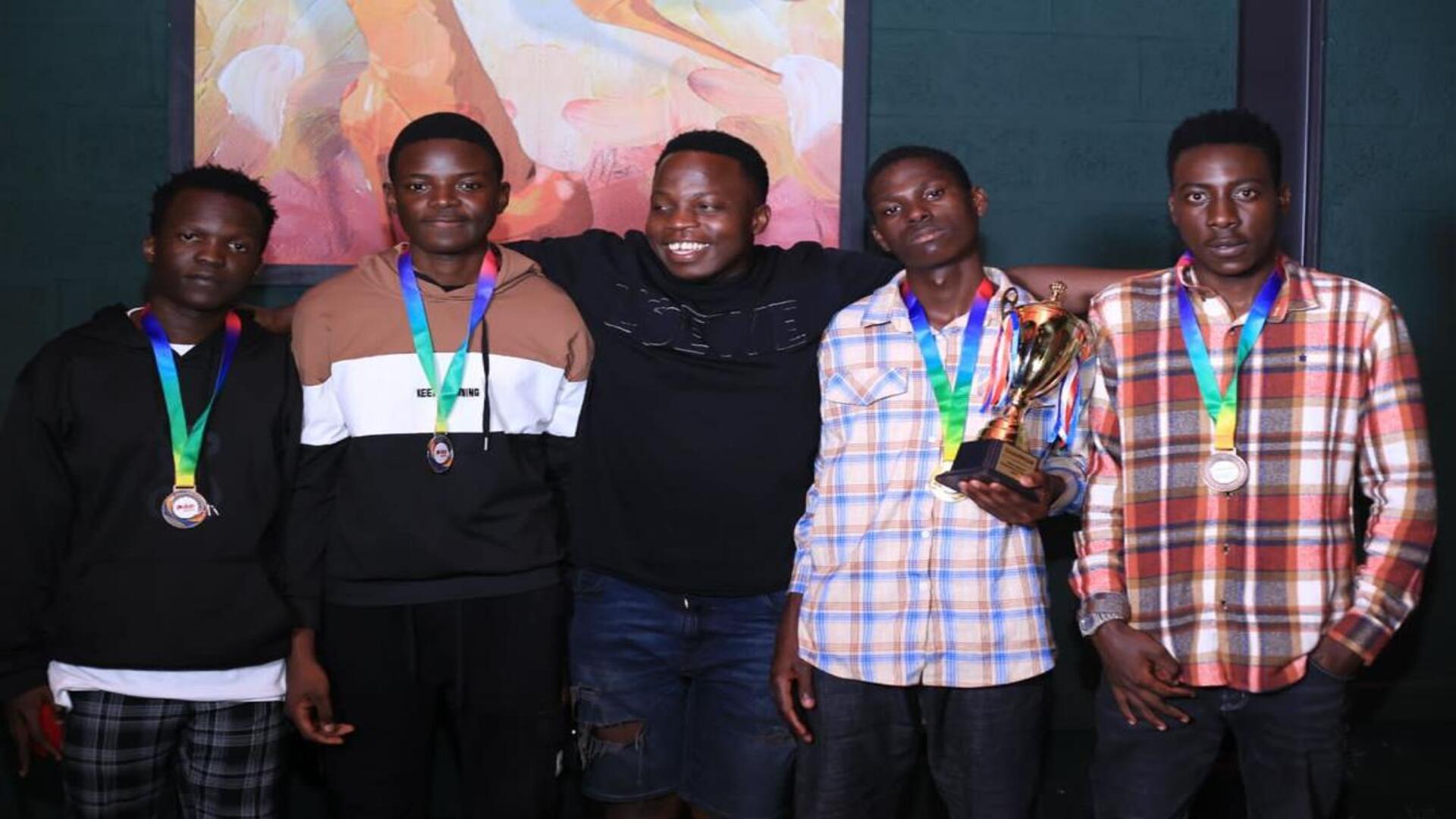 Aksam and fellow Ugandan pros